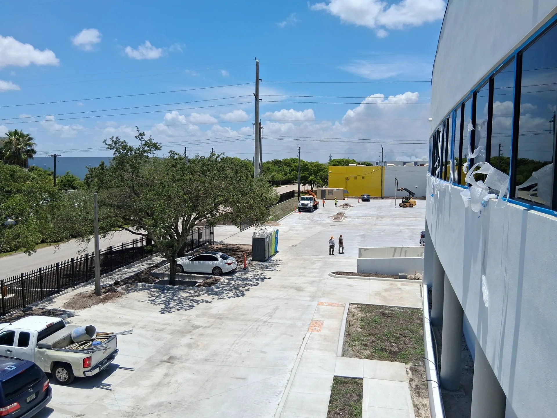 Exterior yard and building facade under construction